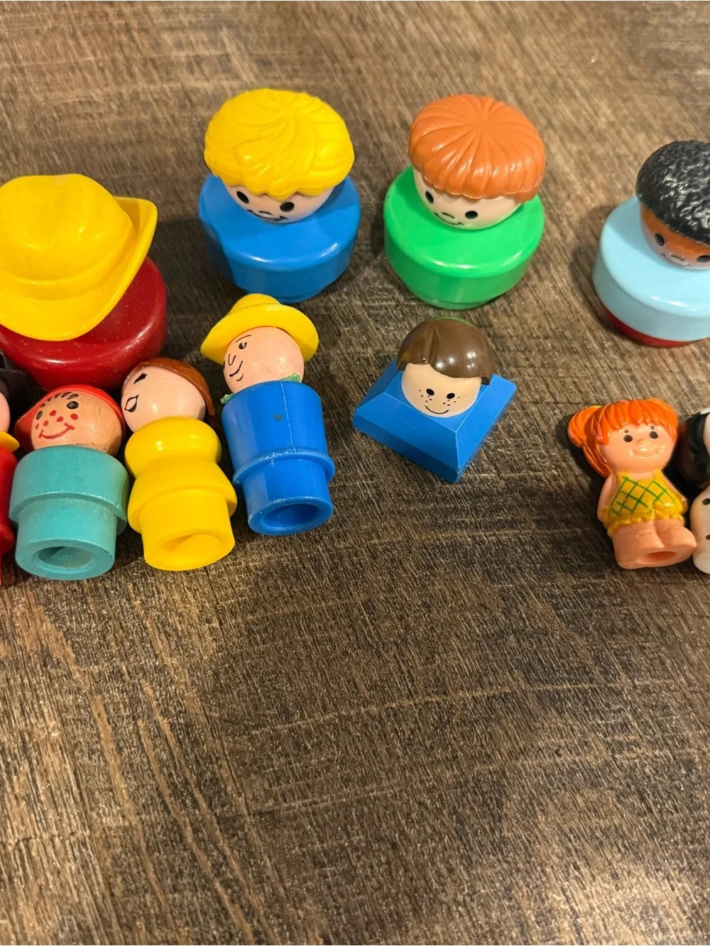 Fisher-Price Peg People Set with Bright Yellow, Blue, Green, Red, Brown